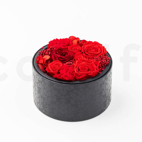 Flowerbox - červené kvety v okrúhlej krabičke